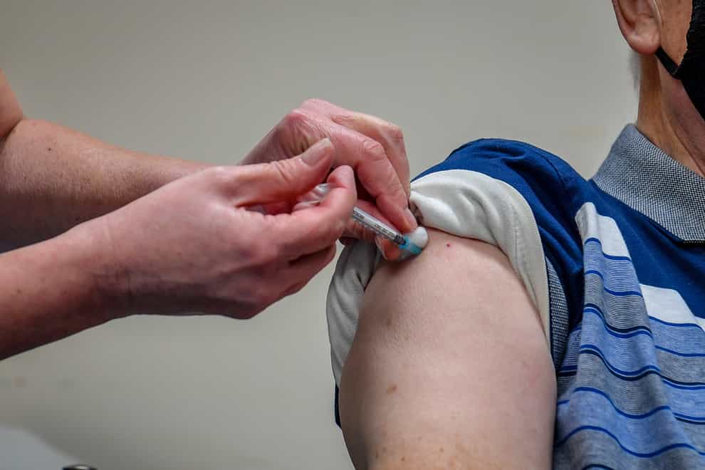 A single dose of the Oxford University/AstraZeneca Covid-19 vaccine is given to a patient