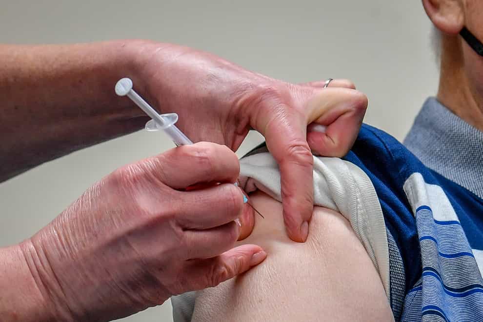 A single dose of the Oxford University/AstraZeneca COVID-19 vaccine is given to a patient