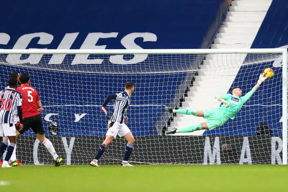 West Brom goalkeeper Sam Johnstone (right) produces a brilliant late save to earn his side a point