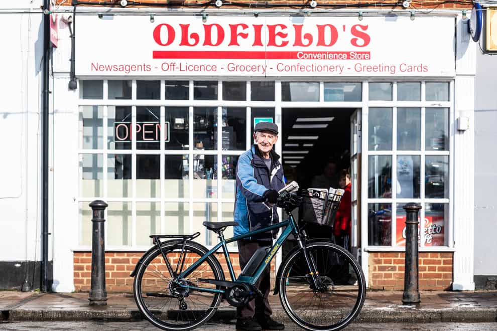 EMBARGOED TO 0001 MONDAY FEBRUARY 15 EDITORIAL USE ONLY George Bailey, who is one of the oldest paperboys in the UK, completes his paper round in Maidstone, Kent, on his new Raleigh e-bike, which has been given to him by Evans Cycles to celebrate his 80th birthday (Raleigh/Evans Cycles/PA)
