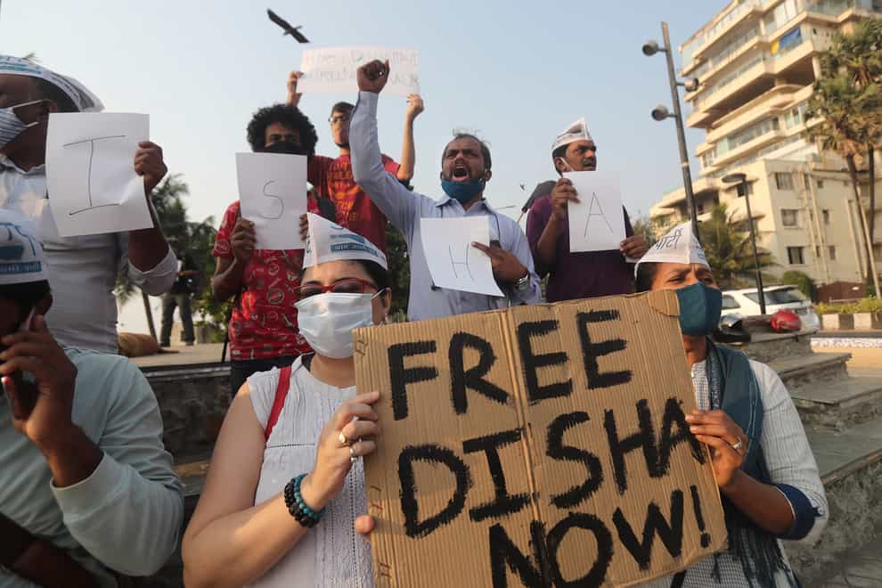 Members of the Aam Aadmi Party demand the release of Indian climate activist Disha Ravi during a protest in Mumbai
