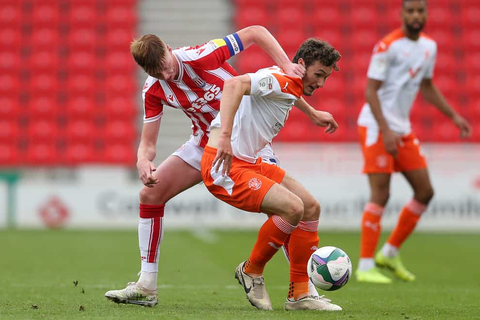 Blackpool’s Matty Virtue, right, should be available against Rochdale