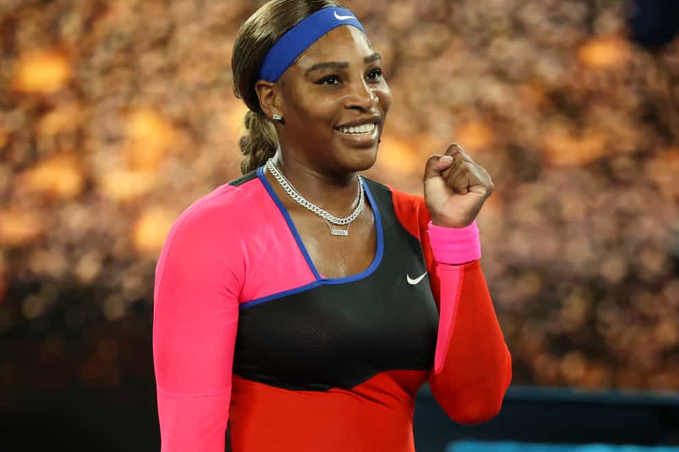 Serena Williams smiles after beating Simona Halep