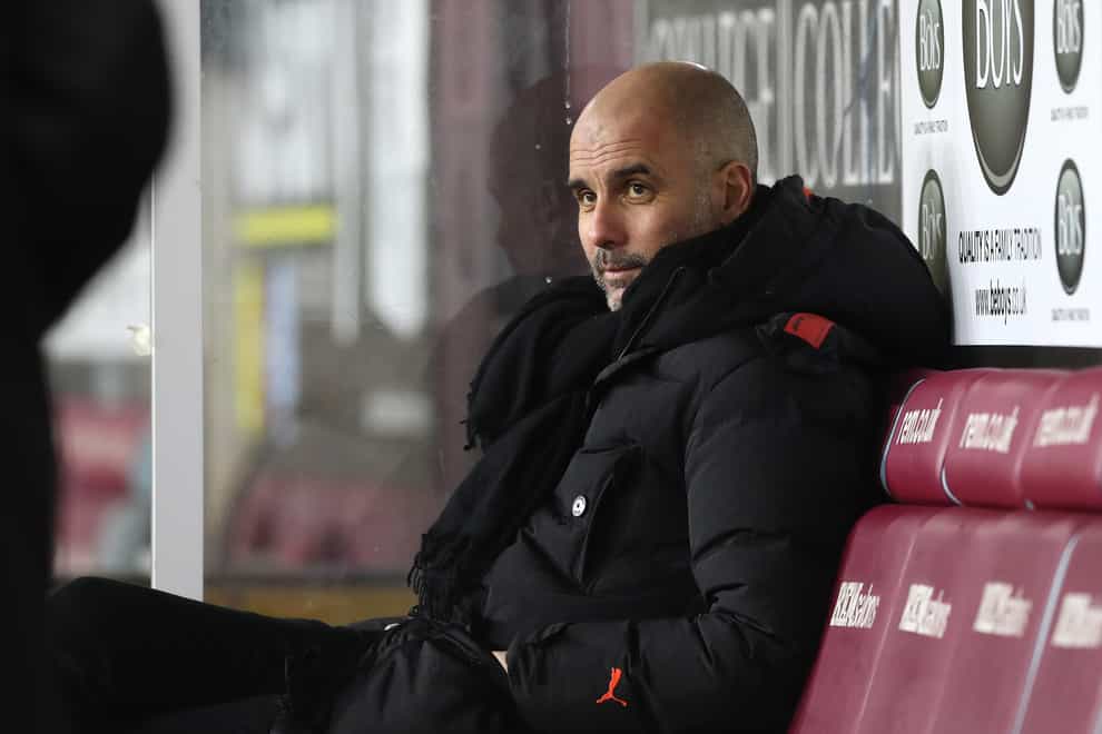 Pep Guardiola in the dugout