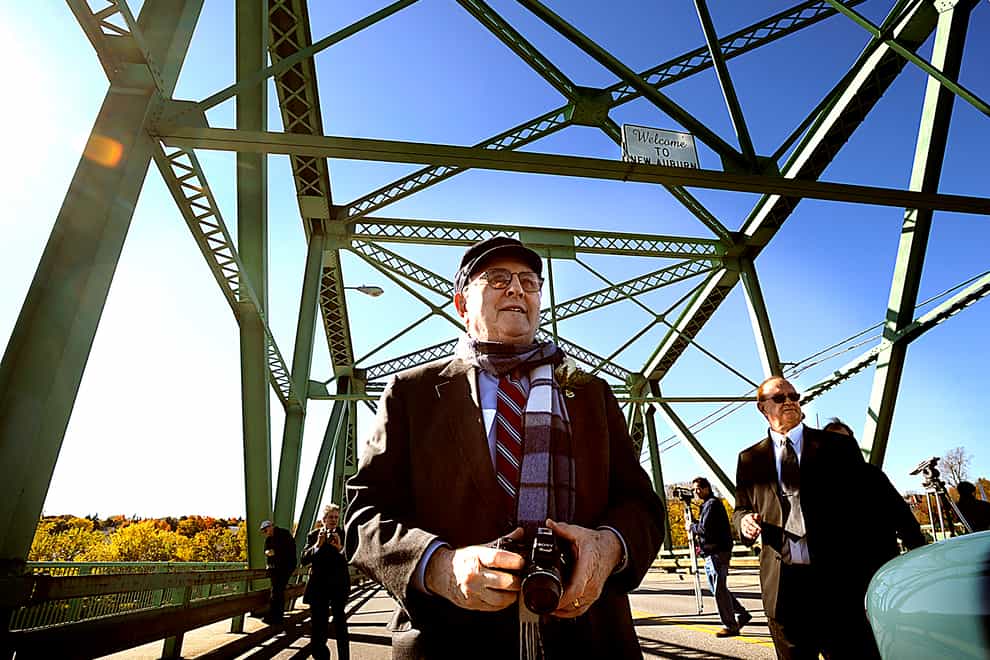 Dr Bernard Lown walks on the bridge renamed in his honour (Jose Leiva/AP)