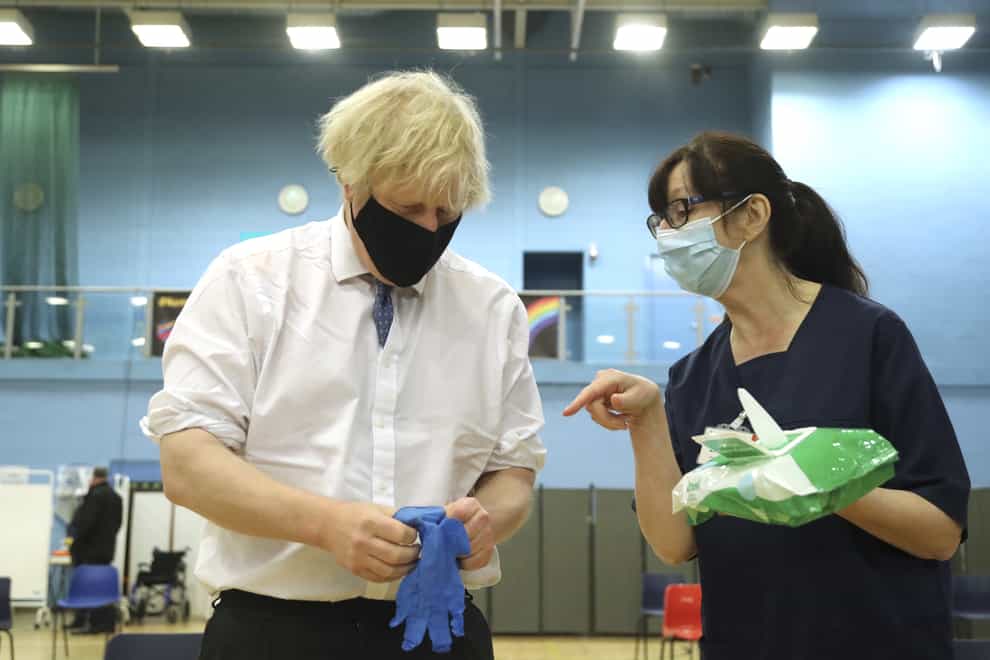 PM Boris Johnson and health worker Wendy Warren