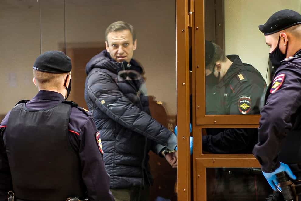 Russian opposition leader Alexei Navalny, centre, appears in court