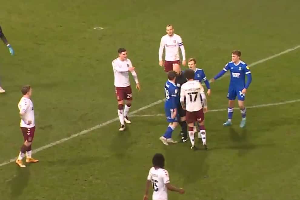 Referee Darren Drysdale embroiled in confrontation with Ipswich's Alan Judge