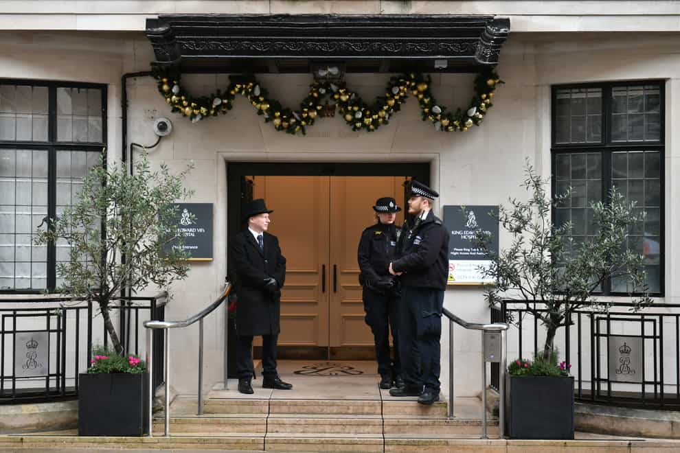 Police officers outside King Edward VII’s Hospital in London