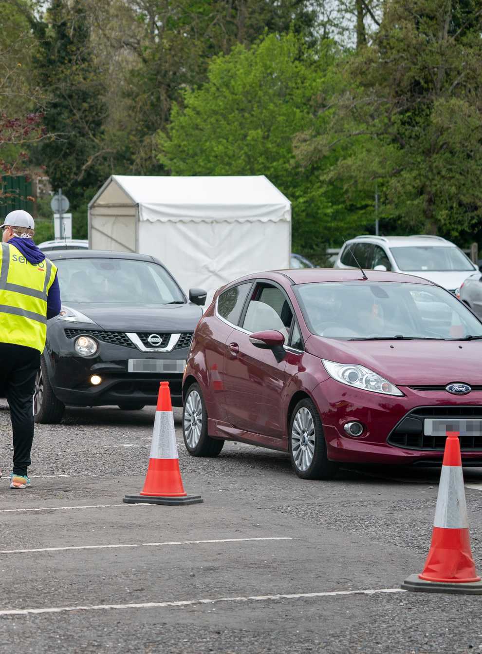 Cars queued at a coronavirus testing site