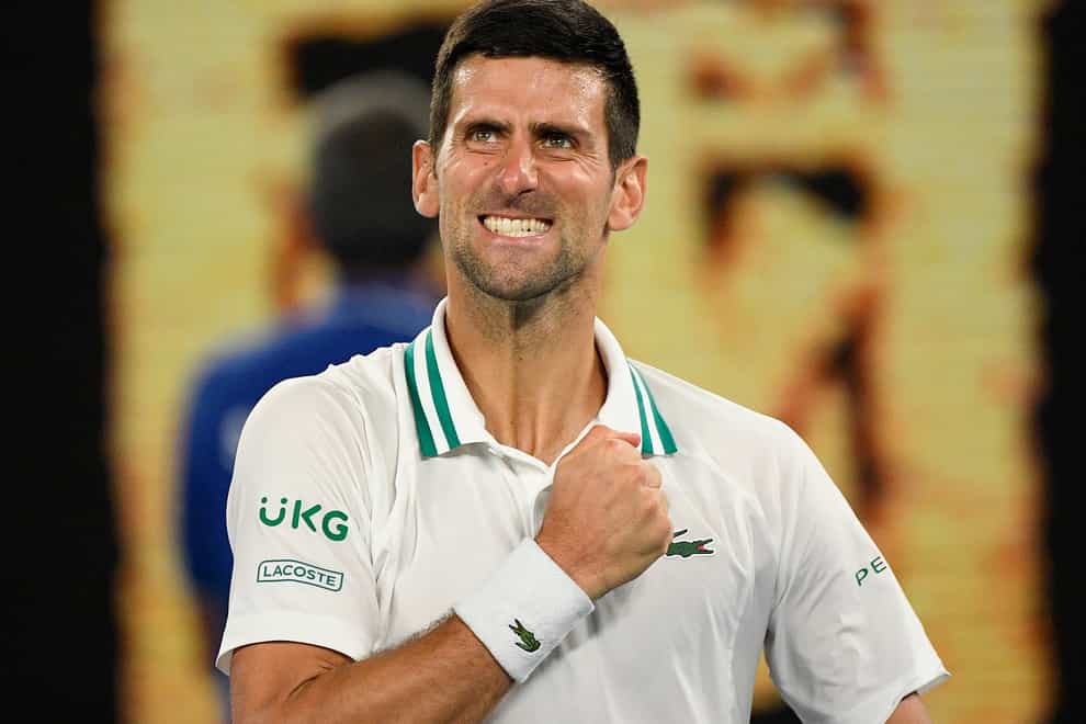 Novak Djokovic celebrates after defeating Aslan Karatsev