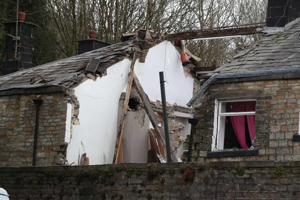 The remains of the property in Ramsbottom, Bury (Peter Byrne/PA)