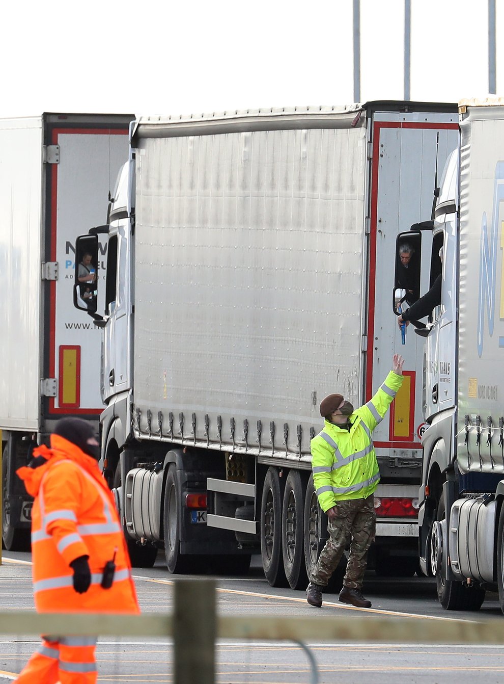 Army personnel helping lorry drivers with their Covid-19 testing