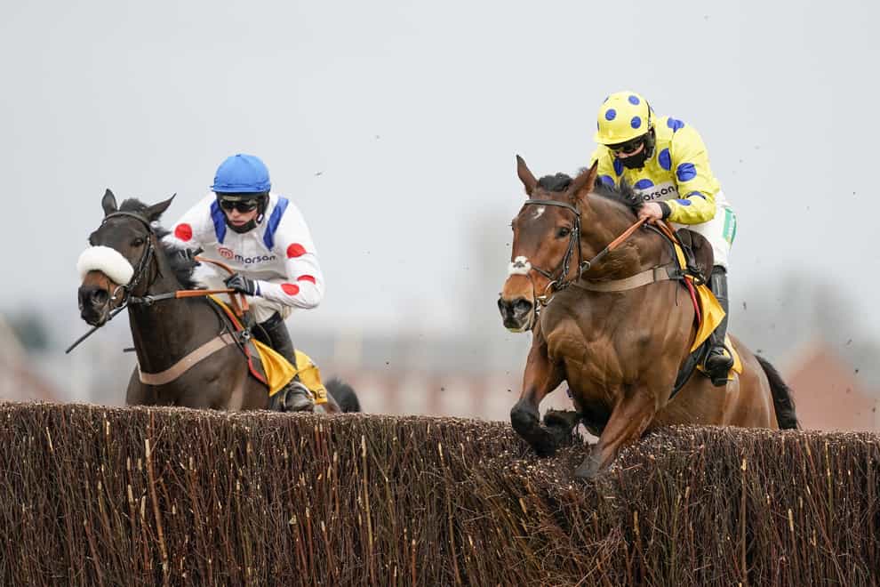 Secret Investor (right) on his way to winning the Denman Chase