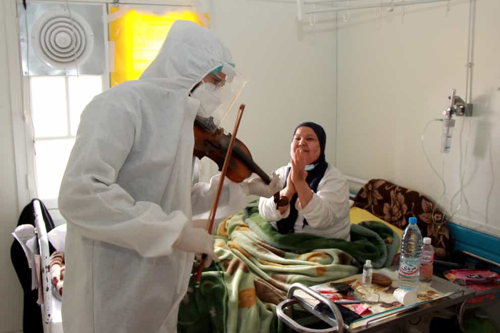 Dr Mohamed Salah Siala plays the violin for patients on the Covid wards of the Hedi Chaker hospital in Sfax, eastern Tunisia
