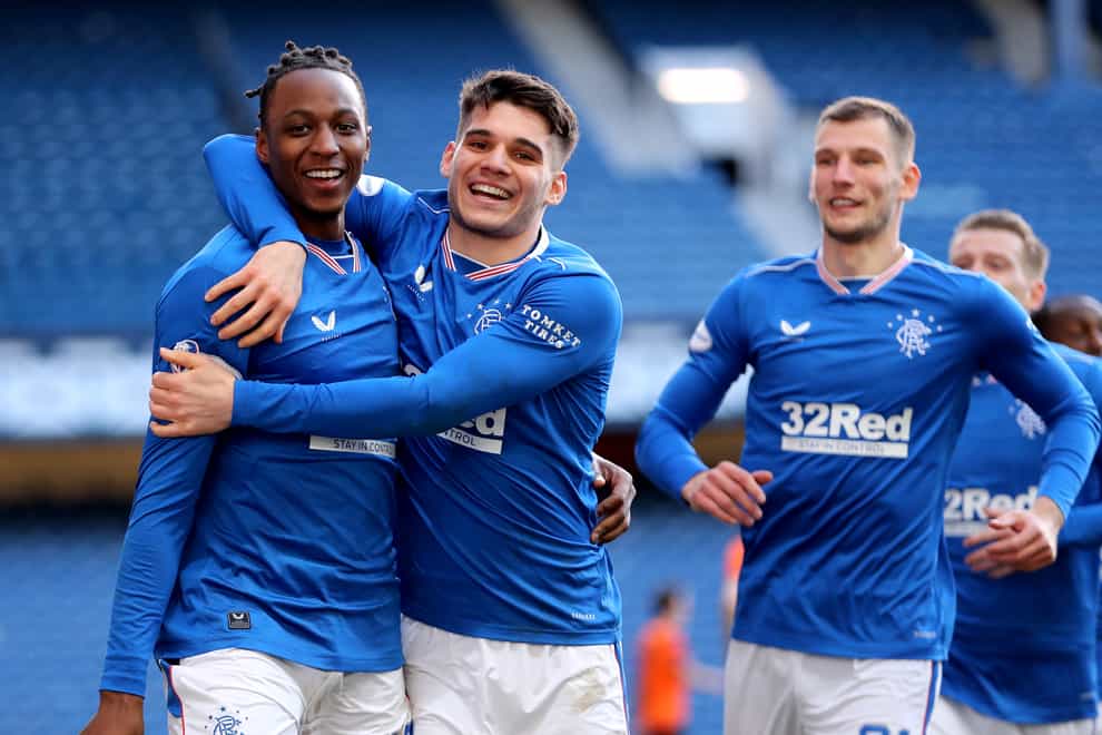 Rangers’ Joe Aribo (left) celebrates after netting against Dundee United