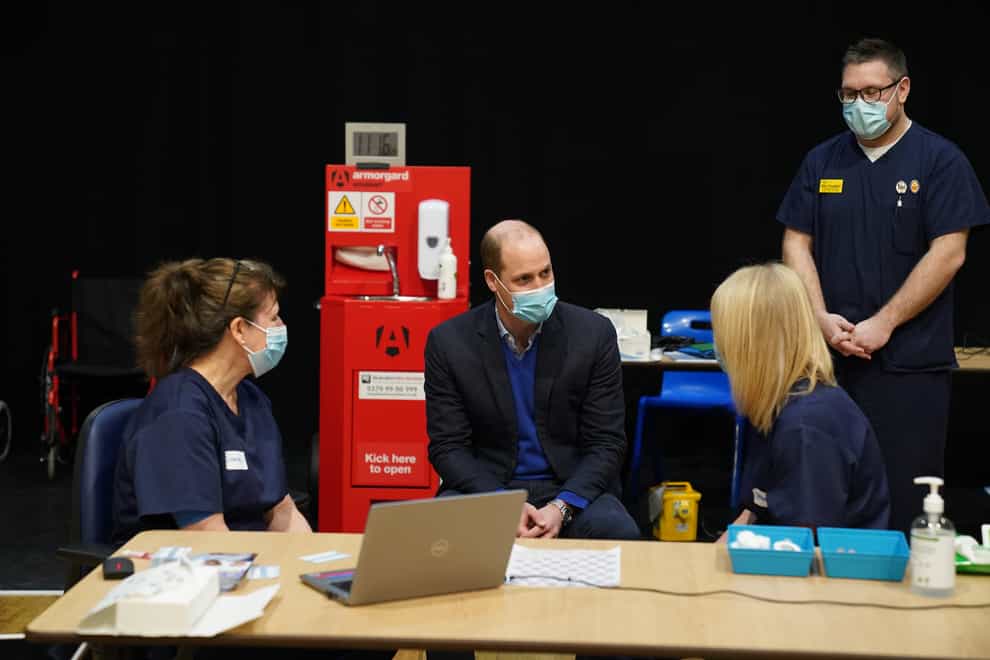 The Duke of Cambridge meets staff at a Covid vaccination centre