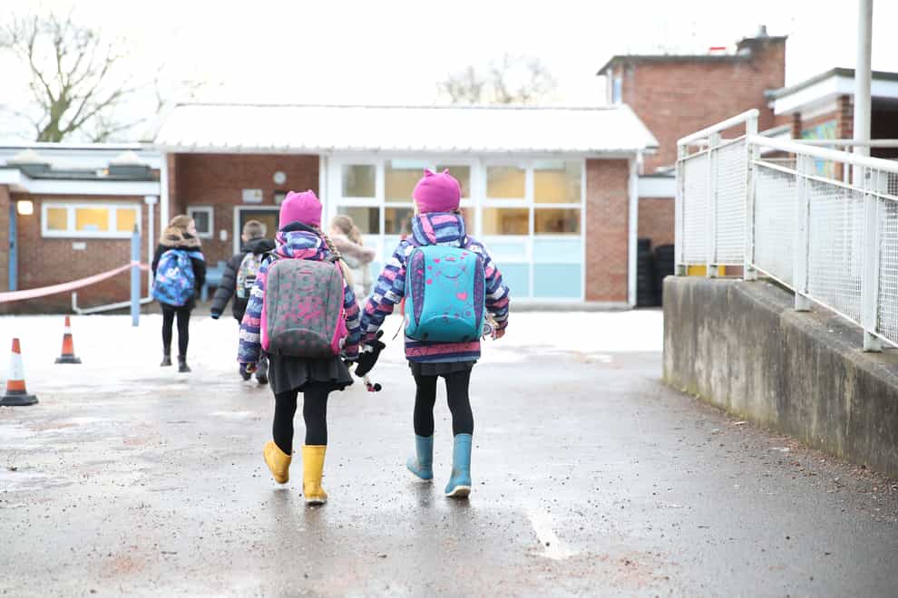 Pupils arrive at school
