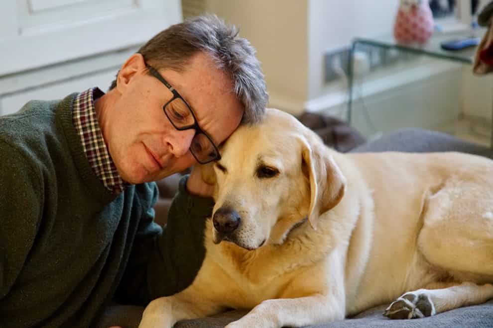 Nicky Campbell and his Labrador Maxwell (Nicky Campbell/PA)