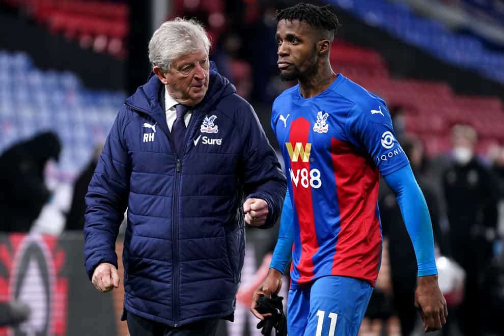 Crystal Palace manager Roy Hodgson, left, is eager for the return of Wilfried Zaha