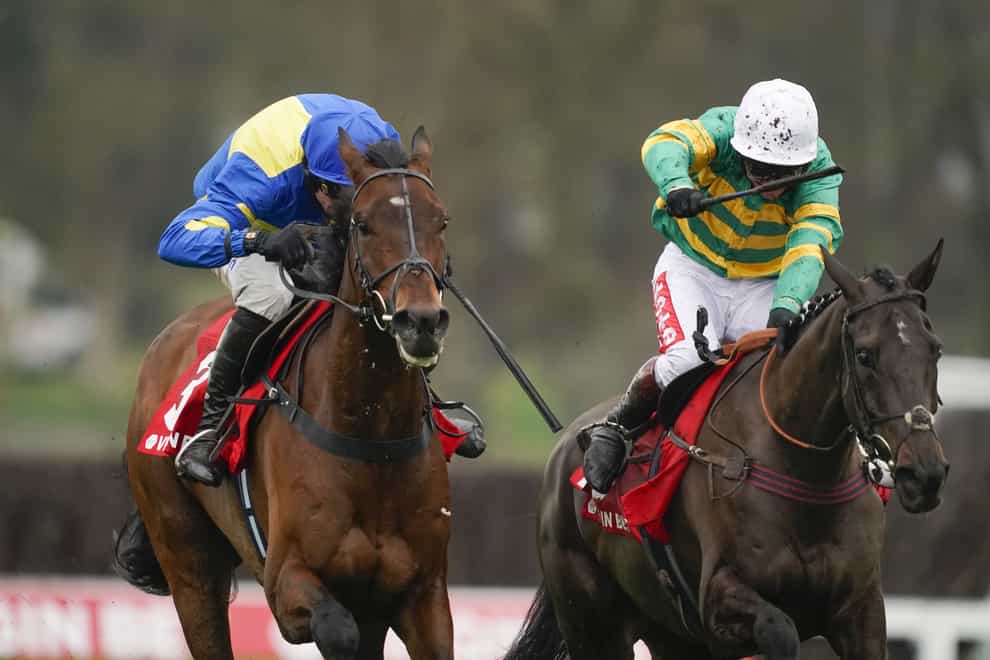 Sporting John (right) gets the better of Shan Blue