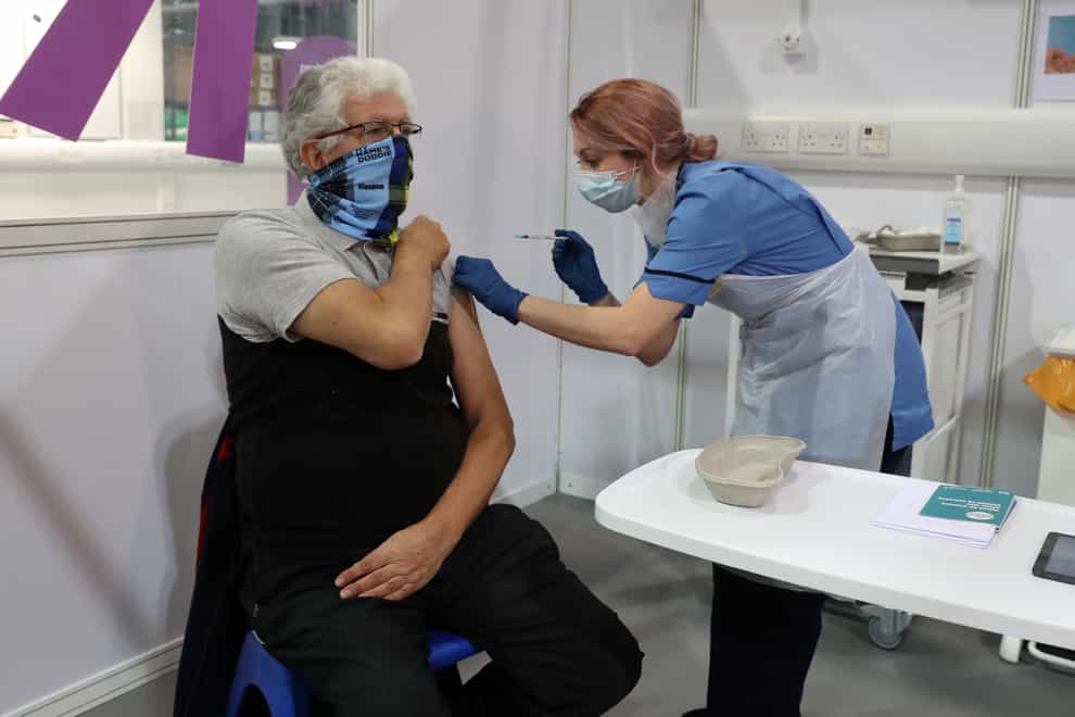 A coronavirus vaccine is administered
