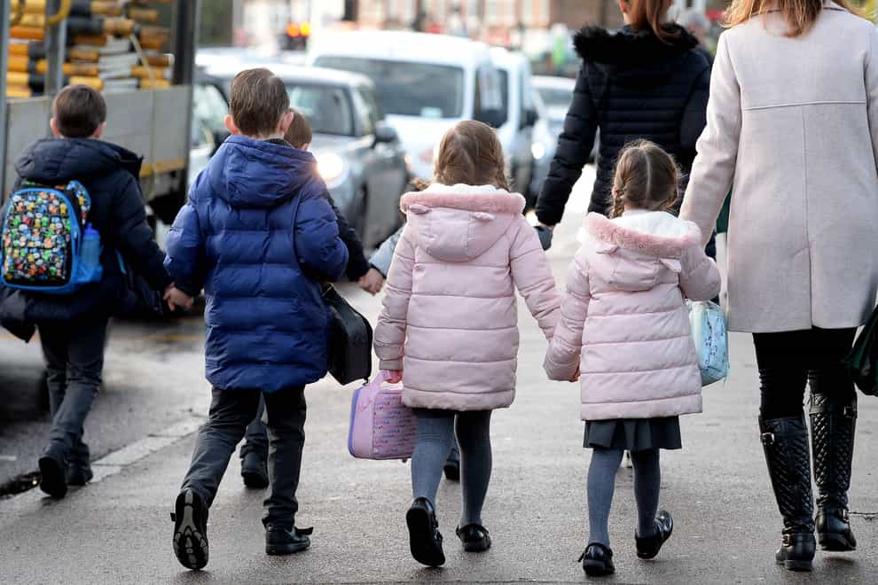 Children and parents walking to school
