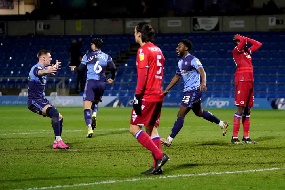 Fred Onyedinma, second right, celebrates his winner