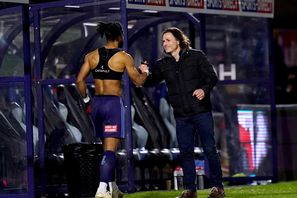 Wycombe manager Gareth Ainsworth, right, congratulates Garath McCleary