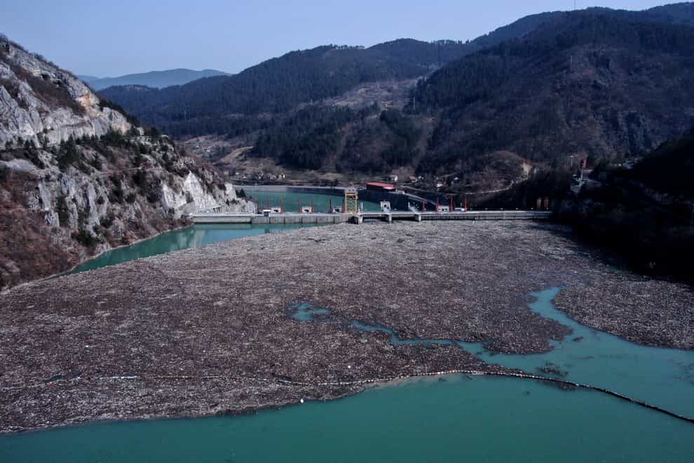 An aerial photo shows rubbish floating in a river in Bosnia