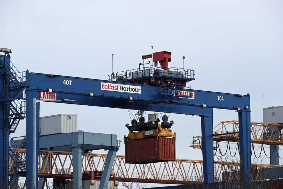 A cargo crate being moved in Belfast Port, the post-Brexit Northern Ireland Protocol has left freight companies struggling for return loads after after extra paperwork has been required with some hauliers based in Northern Ireland seeing revenues fall by up to 30% in January, an industry representative has said (Niall Carson/PA)