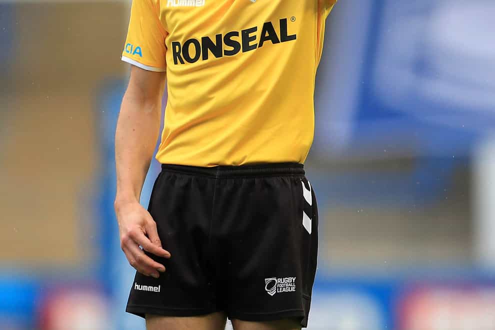Referee James Child during the Super League match at the Halliwell Jones Stadium