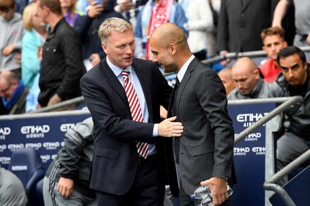Pep Guardiola (right) comes up against David Moyes (left) this weekend