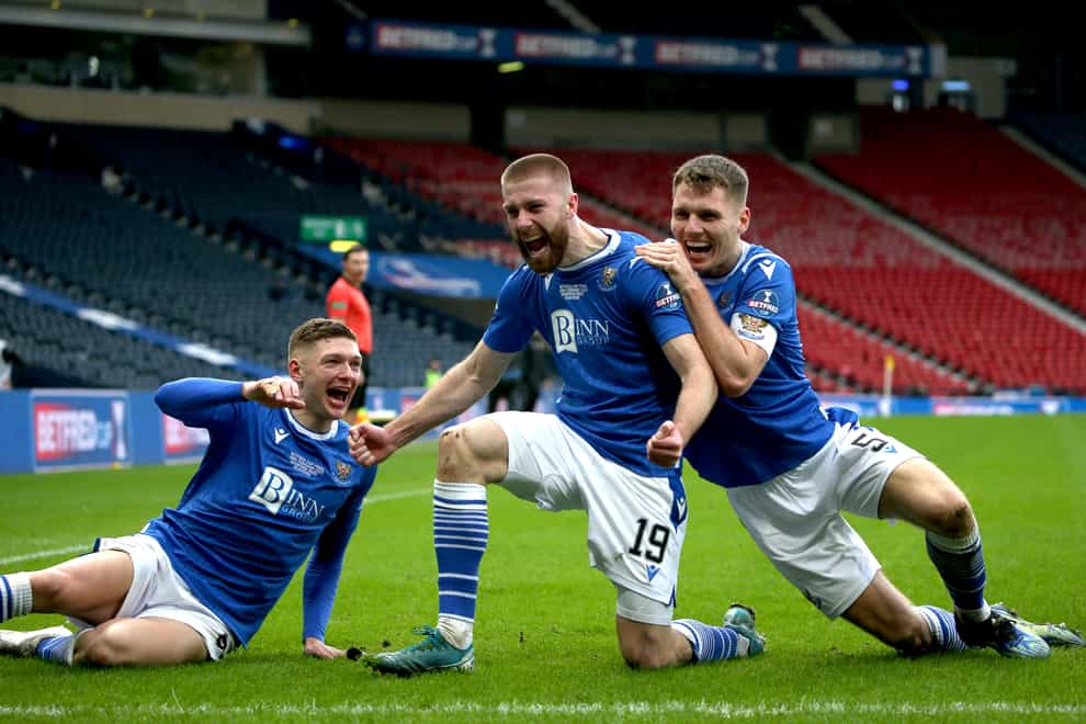 Shaun Rooney, centre, celebrates his goal