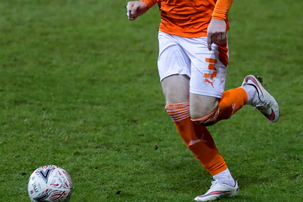 James Husband in action for Blackpool