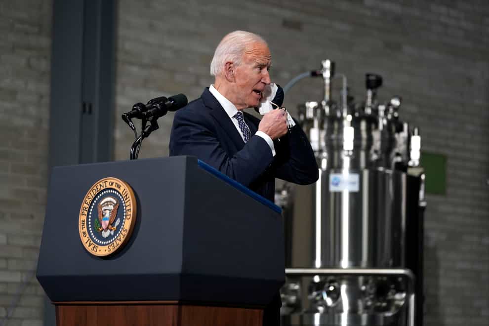 US President Joe Biden has been pictured wearing two masks at once