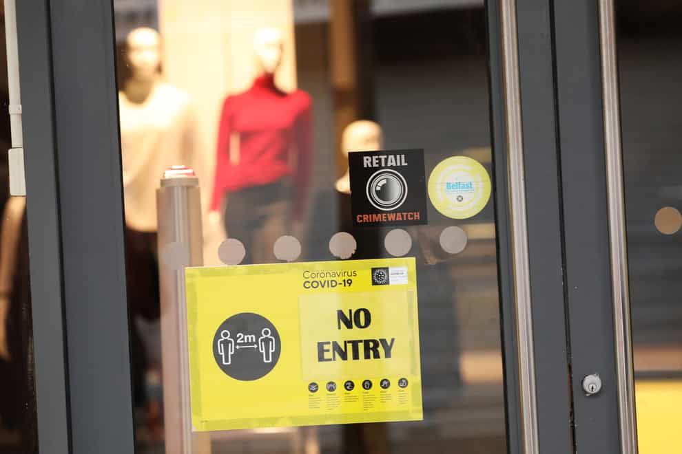 A no entry sign in the window of a shop in Belfast city centre