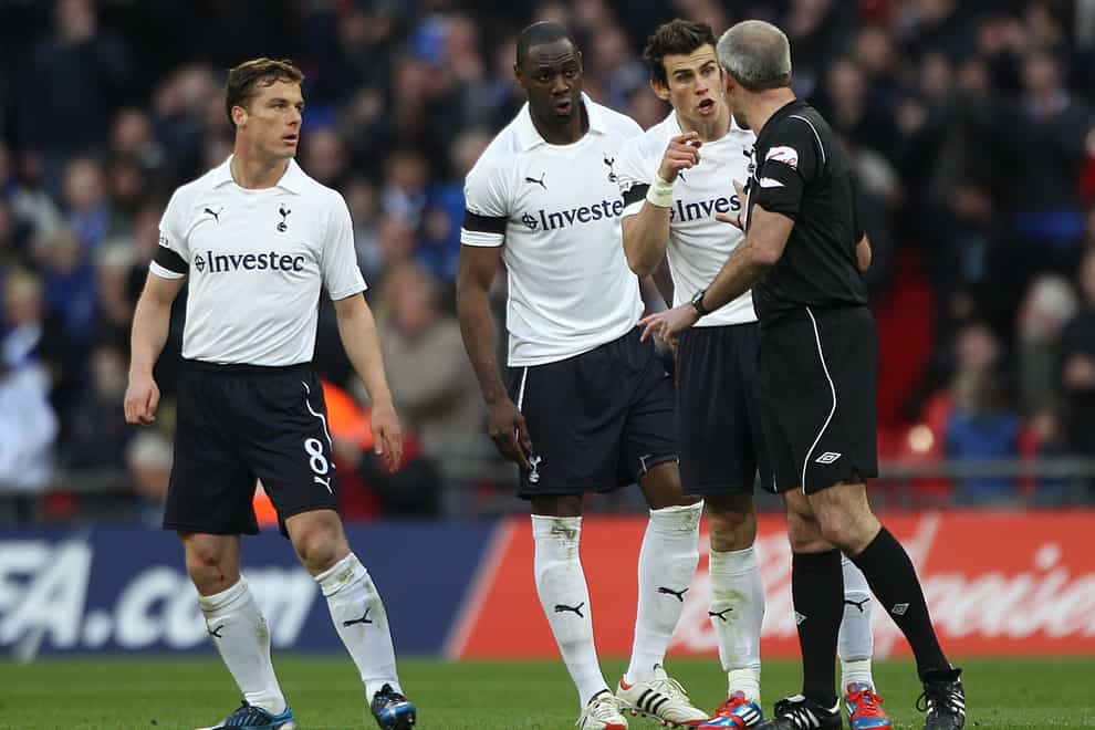 Tottenham’s Scott Parker, Ledley King and Gareth Bale complain to referee Martin Atkinson