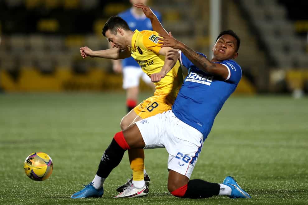Livingston’ Jason Holt (left) was left 'gutted' again after the Lions late defeat to Rangers