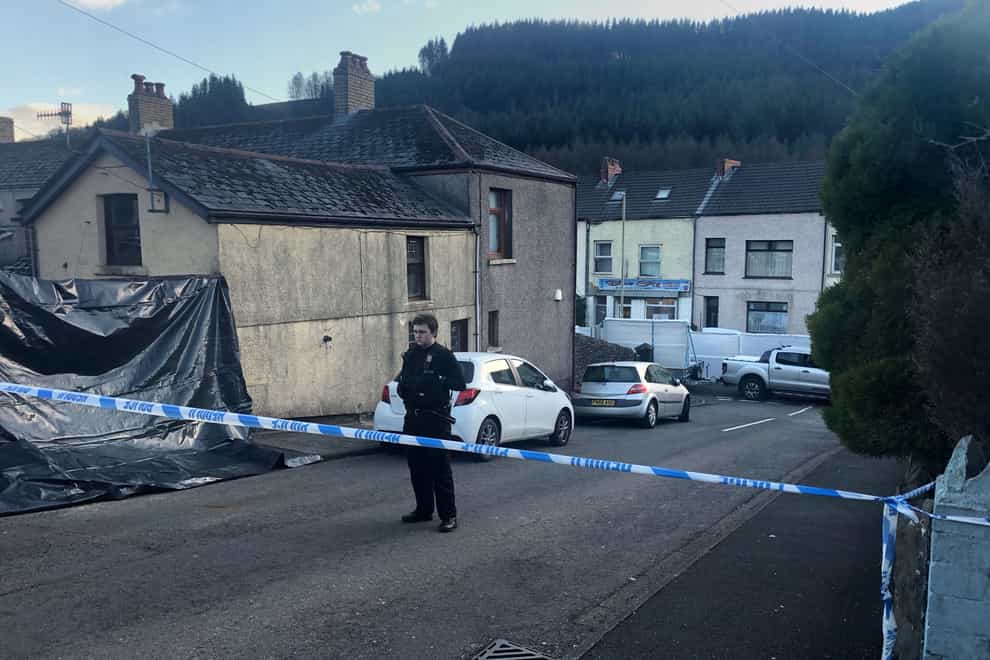 Police at the scene in the village of Ynyswen in Treorchy, Rhondda