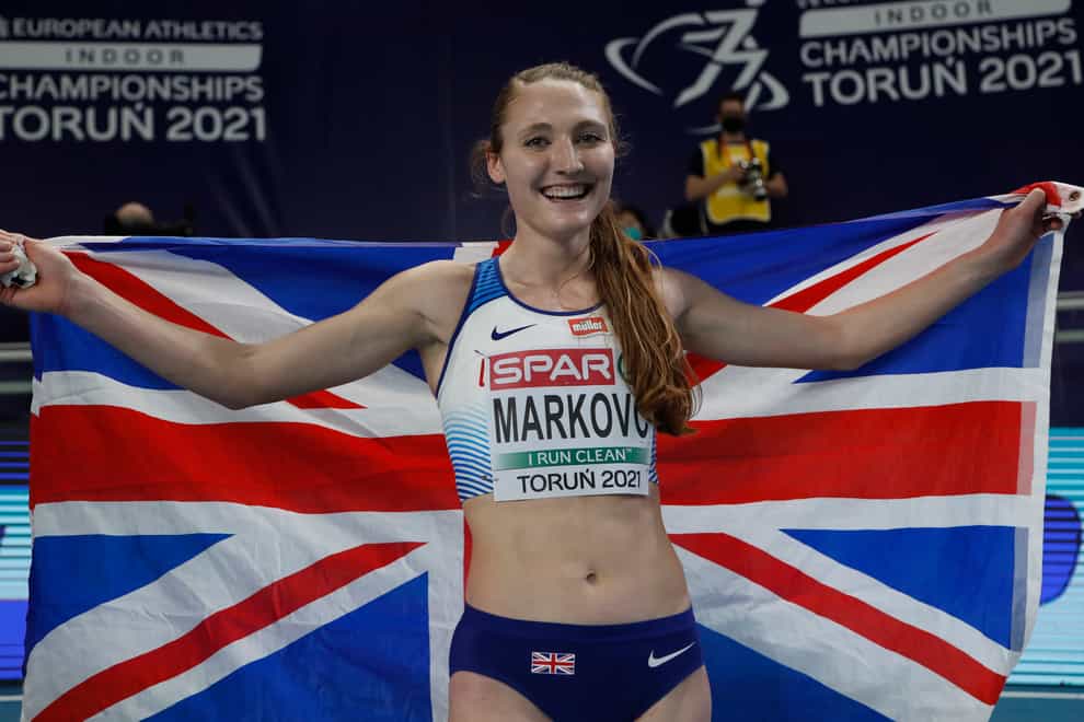 Amy-Eloise Markovc celebrates after winning the women’s 3,000 metres
