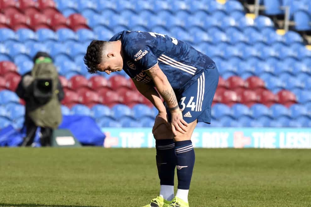 Granit Xhaka hangs his head after gifting Burnley a goal