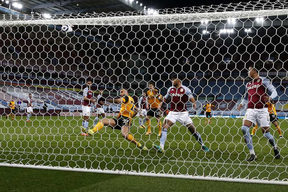 Romain Saiss shoots over during Wolves' 0-0 draw at Aston Villa