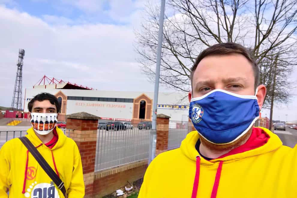 Michael Wilson and Robert Wilson-Rust joined hundreds in walking to their local football stadiums