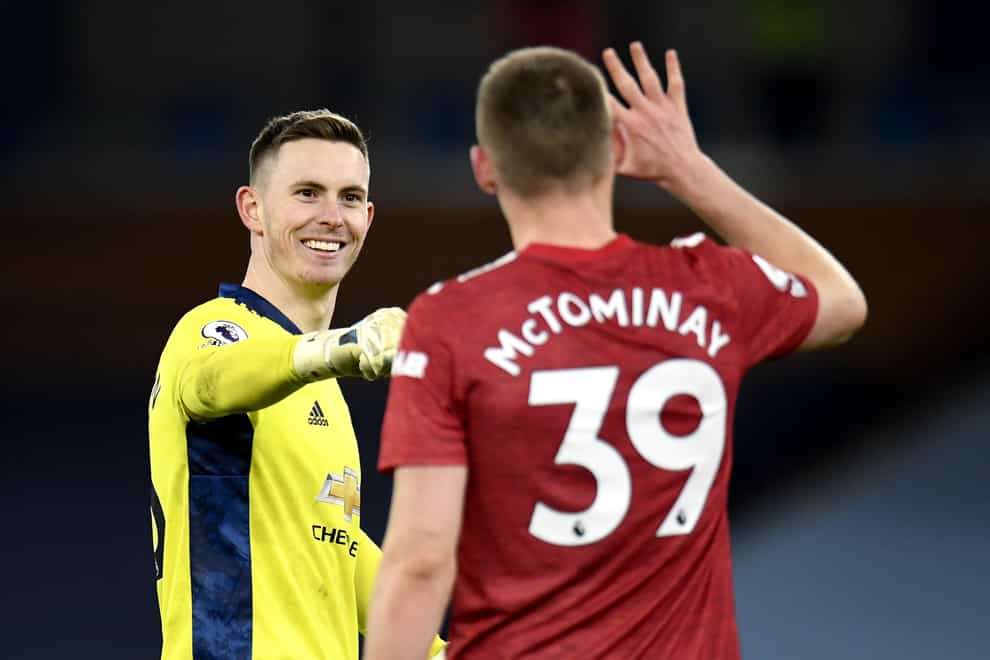 Dean Henderson, left, and Scott McTominay celebrate United's win
