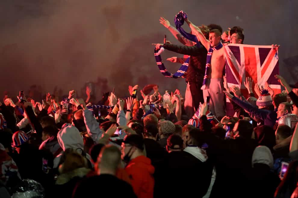 Rangers fans celebrate in George Square after the club's title win