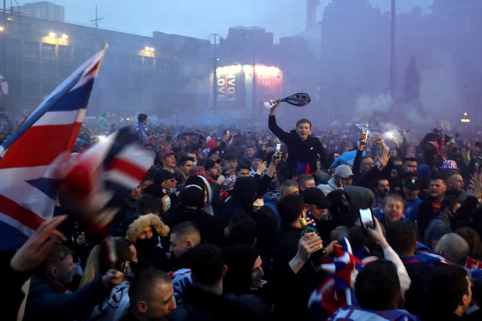 Rangers fans celebrate in George Square (Jane Barlow/PA)