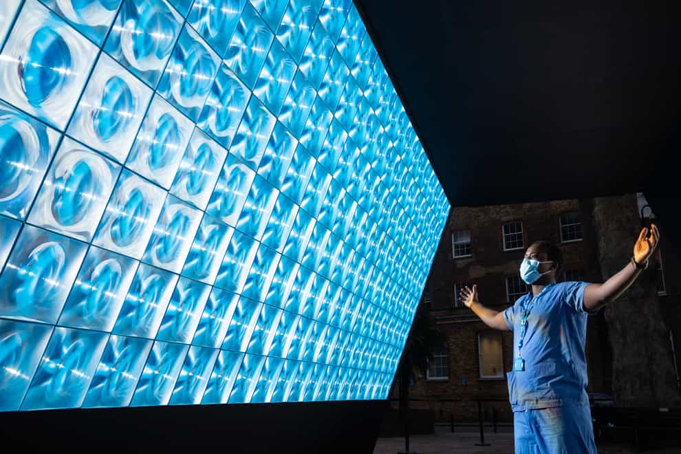 Trauma and orthopaedic surgeon Frank Acquaah looks at the Tunnel of Light at Guy's and St Thomas' Hospital in London