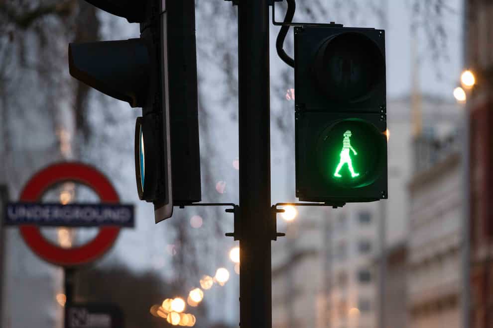 The green woman traffic signal