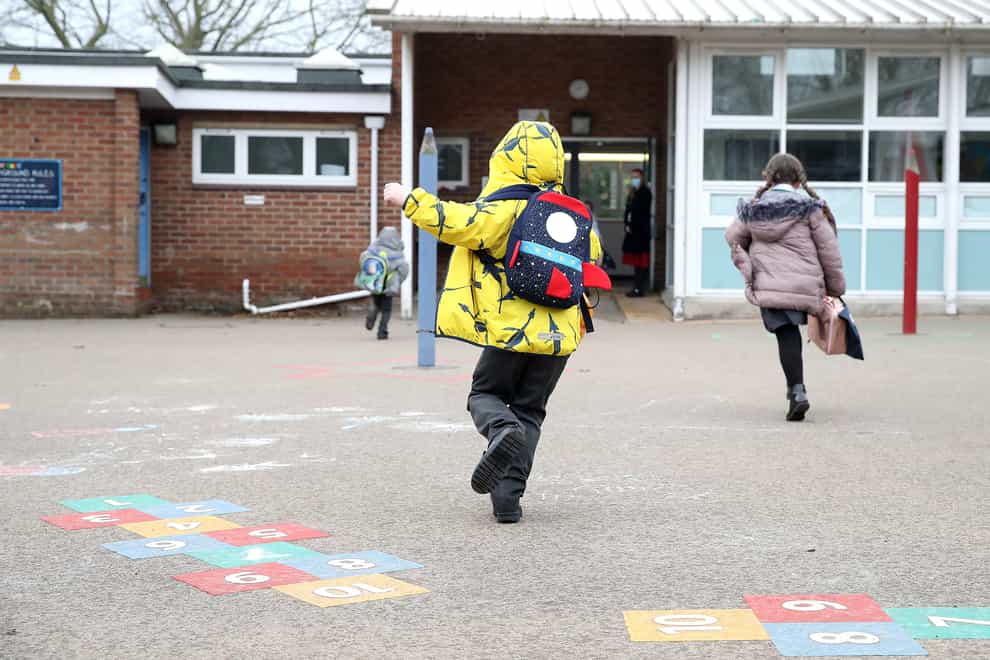 Children arrive at Manor Park School and Nursery in Knutsford, Cheshire